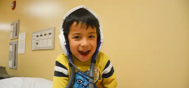 Tips, Tricks and TVs: Multiple ways to get your child through an MRI